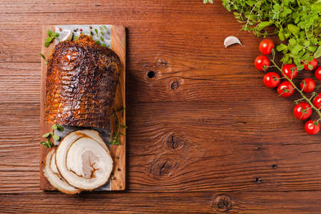 Rolled, roasted pork belly. Top view.の写真素材