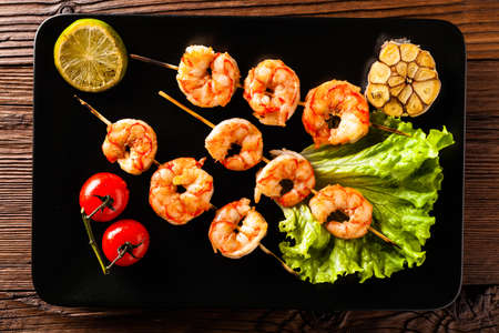 Grilled shrimp skewers. Top view.の写真素材