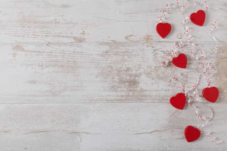 Valentine's Day.  White background with balloons and red hearts.