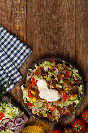 Gyros, kebeb. Salad with mutton and vegetables. Top view. の写真素材