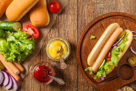 Delicious homemade hot dogs. Served with chips. Top view.の写真素材