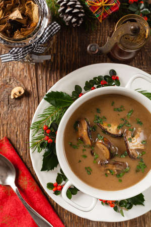 Traditional mushroom soup, made from porcini mushrooms. Christmas decoration. Top view.の写真素材