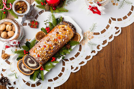 Poppy seed roulade in Christmas decoration. Top view.の写真素材