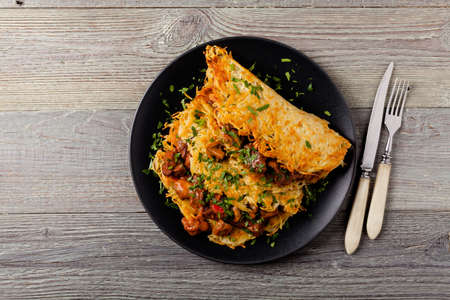 Hungarian potato pancake with goulash. Top view.の写真素材