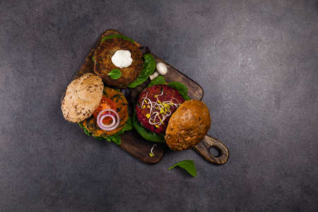 Vege burgers with carrots, beetroots and mushrooms.の写真素材