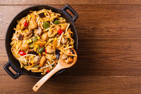 Indonesian pasta with chicken, pieces of bamboo and mushrooms. Top view.の写真素材