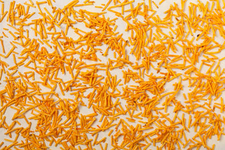 Background made of chips, prays and/or popcorn. Top view.の写真素材