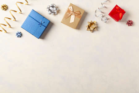 Gift Wrapping. A bright background with packaging accessories and gifts. Place for description. Top view.の写真素材