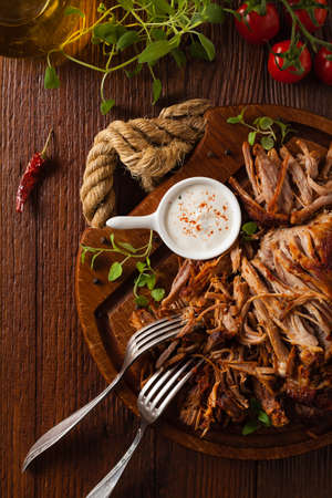 Pulled pork on a wooden board. Top view.の写真素材