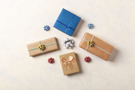 Gift Wrapping. A bright background with packaging accessories and gifts. Creative composition. Place...