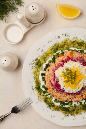 Traditional Russian Mimosa salad with salmon cheese and potatoes. Top viewの写真素材