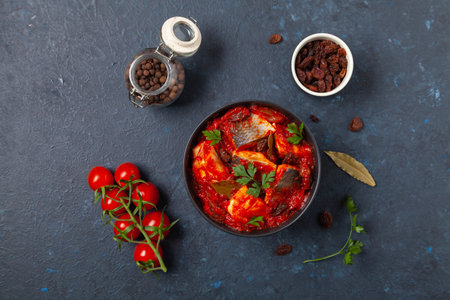 Herring fillet salad in tomato sauce with raisins.の写真素材