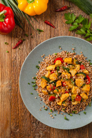 Buckwheat with chicken and vegetables. Top view.の写真素材