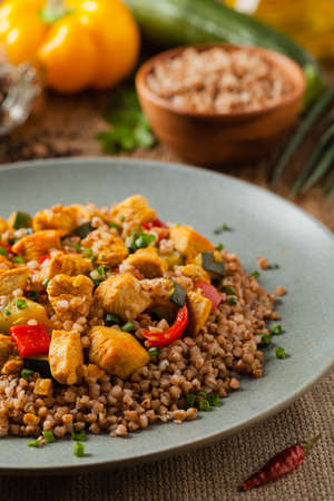 Buckwheat with chicken and vegetables. Front view.の写真素材