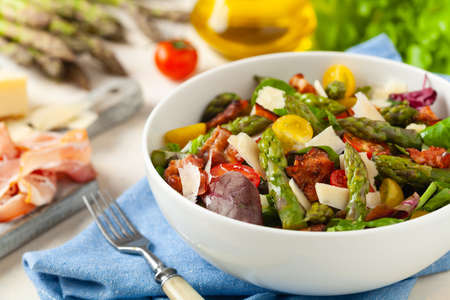 Salad with asparagus and bacon. Front view.の写真素材
