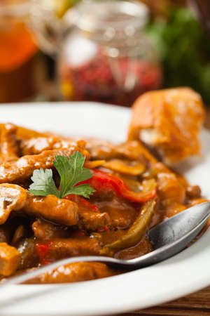 Boeuf, Stroganov, Strogonov. Classic, Russian beef stew. Served on a white plate. Front view. Natural background.の写真素材
