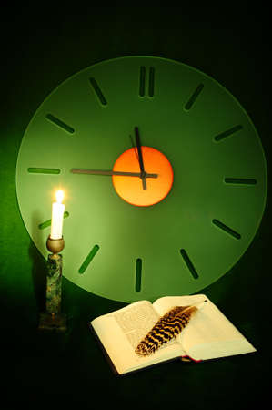 Still Life with a Clock, an Open Bible and a Lighted Candle on the Green Velvet