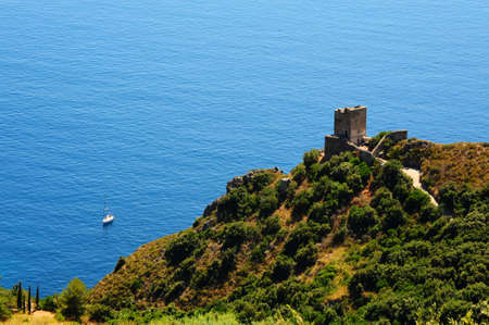 A Typical Italian Seascape With Ruins of a Medieval Fortressの写真素材