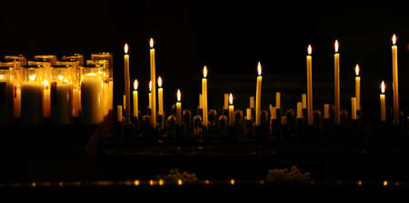 Burning Candles Before The Altar In The Churchの写真素材