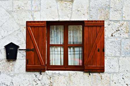 Decorated Closed Window and Postbox in Spanish Townの写真素材