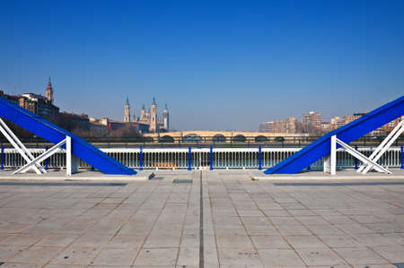 View to Cathedral through Elements of the Metal Bridge, Zaragoza.の写真素材