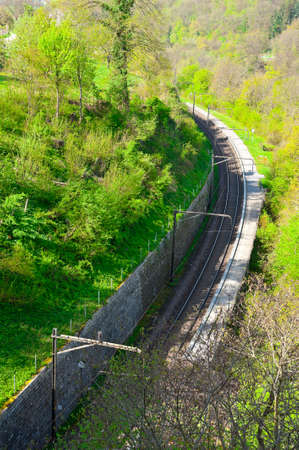 Railroad Track at the Bottom of the Gorge in the Swiss Alpsの写真素材