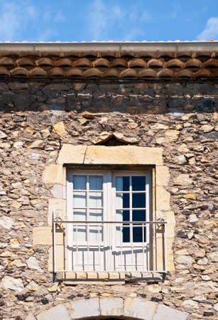 The Windows on the Facade of French Stone Houseの写真素材
