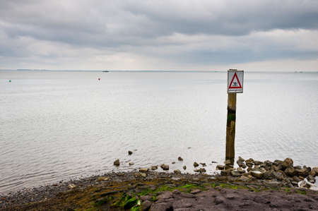 Swimming Prohibited Sign at the North Sea Coast in Zealand, Netherlandsの写真素材