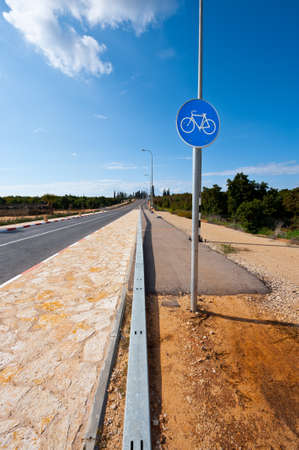 Bike Path near the Asphalt Road in Israelの写真素材