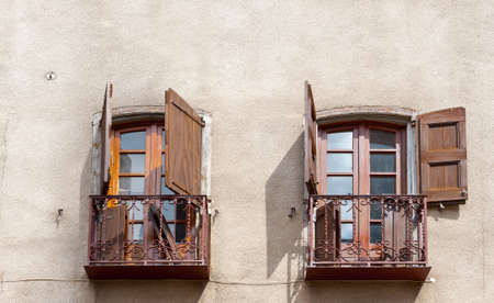 Two French Windows on a Stucco  Wallの写真素材