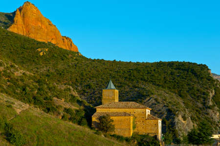 Spanish Medieval Church at the Foot of the Rocks in the Pyreneesの写真素材