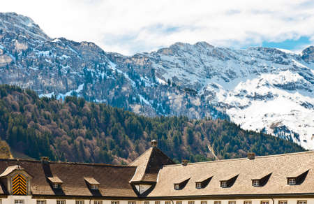 Mansard on the Background of Snow-capped Alps, Switzerlandの写真素材