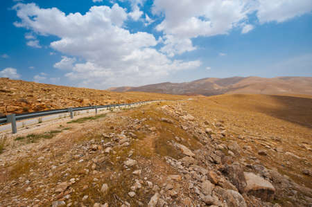 Meandering Road in Sand Hills of Samaria, Israelの写真素材