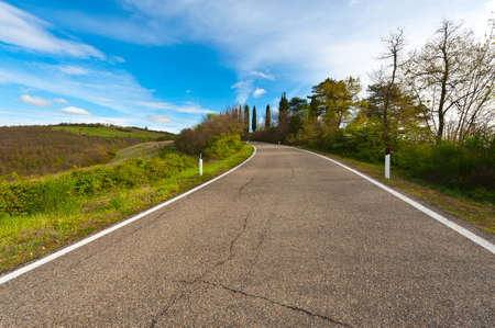 The Farmer's House in Tuscany near Asphalt Roadの写真素材