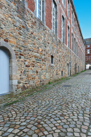 Narrow Alley with Old Buildings in the Medieval Belgian City の写真素材