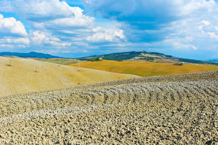 Plowed Sloping Hills of Tuscany in the Autumnの写真素材