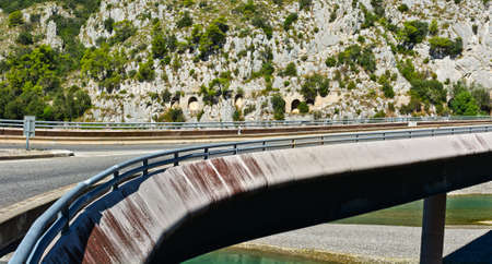 Modern Bridge over the River in the French Alps