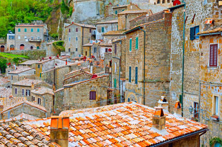 Bird's Eye View on the Roofs of the City of Sorano, Italyの写真素材