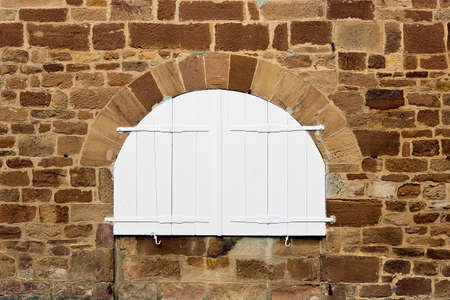French Window with Closed Wooden Shutter