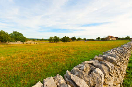 Pasture Divided into Section by the Stone Wallの写真素材