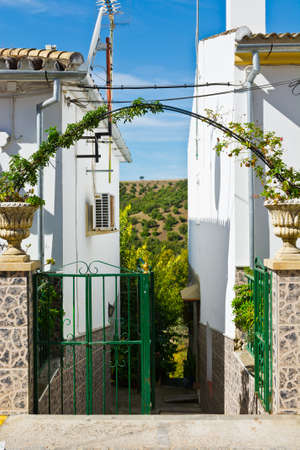 Narrow Passage between Two Houses in Spanish Townの写真素材