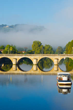Morning Mist in the French City of Terrasson の写真素材