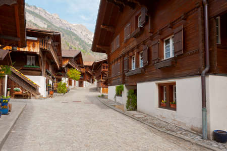 Alley with Old Wooden Buildings in Swiss Villageの写真素材