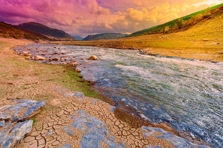 River on the Bottom of Canyon in the Cantabrian Mountain, Sunsetの写真素材