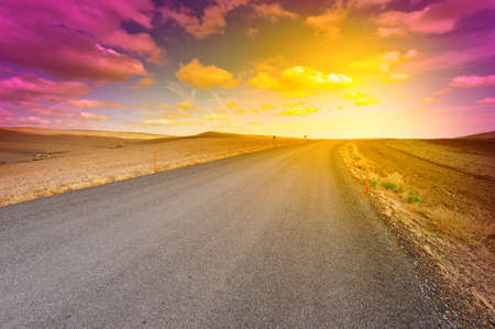 Winding Asphalt Road in Spain, Sunsetの写真素材