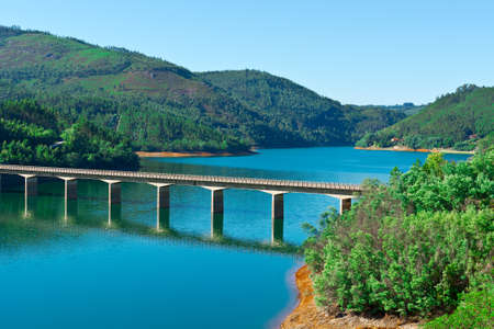 Wooded Shore of the Lake in Portugalの写真素材