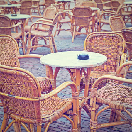 Wicker Chairs  in a Street Cafeの写真素材