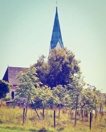 Christian Church with Clock Tower in Southern Bavariaの写真素材