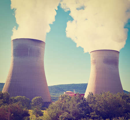 The Smoke from the Chimneys of Cement Plant in France, Retro Effectの写真素材