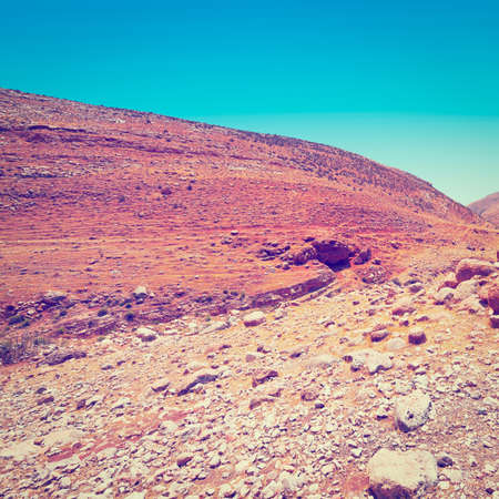 Big Stones in Sand Hills of Samaria, Israel, Retro Effectの写真素材